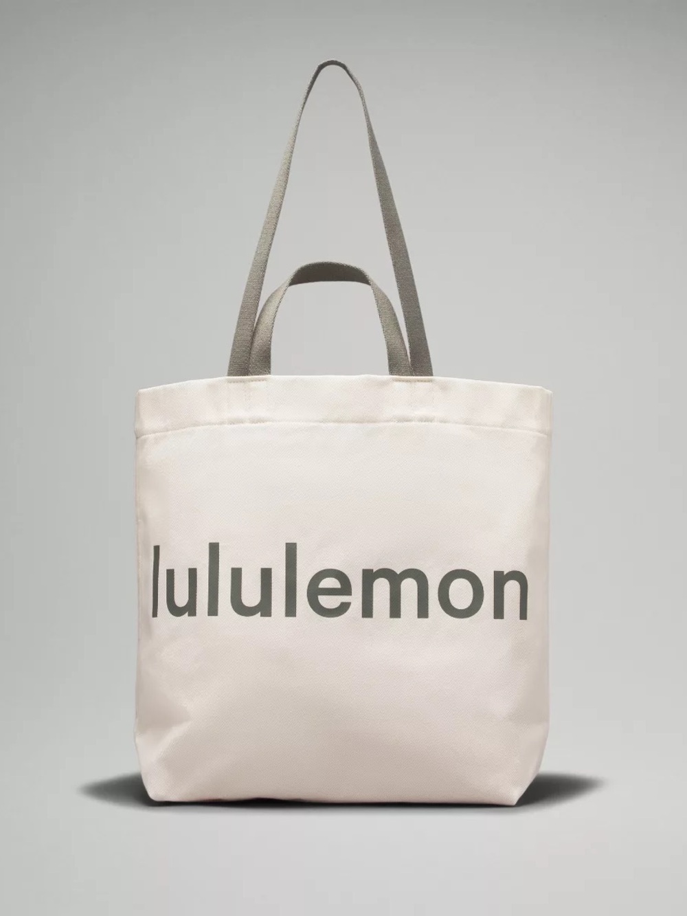 NNWT lululemon athletica Canvas Tote in Cream with Green Logo and Handles